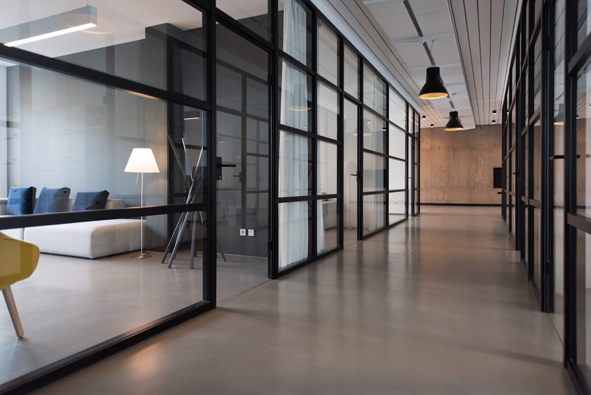 Modern coworking space in Dallas with open desks and private offices for remote workers